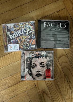 Музичні cd диски eagles, madonna, mika