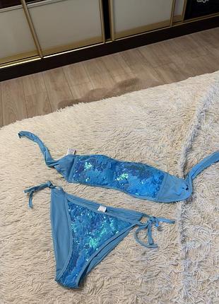 Бирюзовый купальник tezenis украшен сверкающими пайетками
