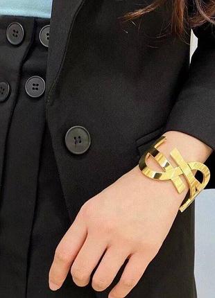 Стильний браслет yves saint laurent золотий для стилізації обʼємний великий
