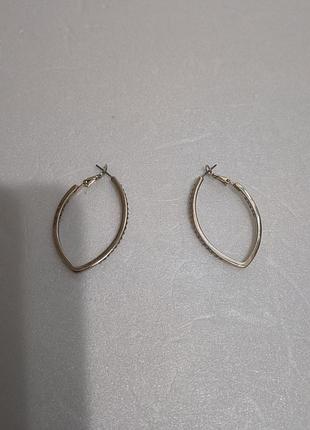 Сережки. золотого кольору
