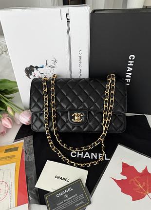 Chanel black gold texture
