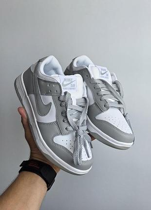 Nike sb dunk 
• grey / white •