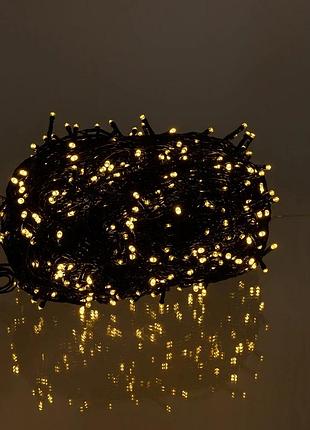 Новорічна гірлянда вулична 100 м 1000 led із сонячною батареєю 8 режимів роботи чорний провід жовте світло sb1000l100mby
