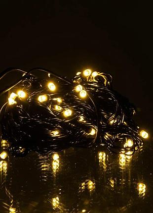 Новорічна кімнатна гірлянда нитка 6 м 50 led чорний провід жовтий w50led6mby