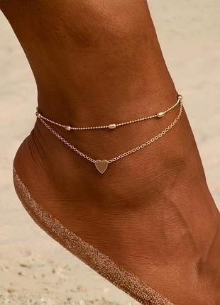 Браслет жіночий на ногу подвійний з підвіскою серце fashion jewelry золотистий
