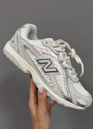 New balance 204l
light grey / silver
