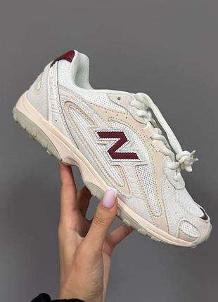 New balance 204l
cream / burgundy