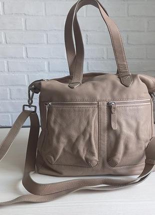 Стильная кожаная сумка samsonite