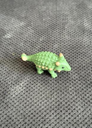 Фігурка динозавра зелена від kinder surprise серії dinosaur natoons