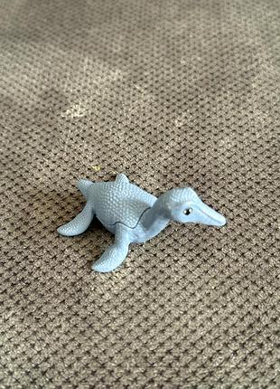 Фігурка динозавра синя від kinder surprise серії dinosaur natoons