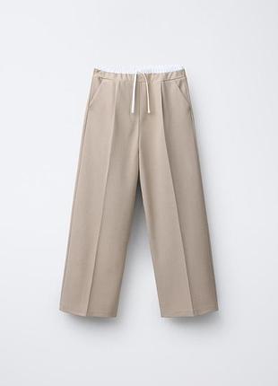 Брюки широкие для девочки брюки палаццо бежевые 122 см zara