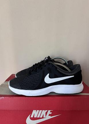 Nike revolution 4 кросівки