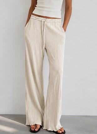 Брюки від бренду zara