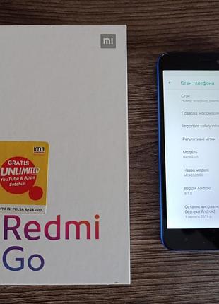 Телефон xiaomi redmi go.