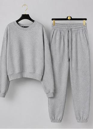 Світло-сірий жіночий теплий костюм zara