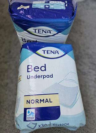 Продам универсальные пеленки  tena новые