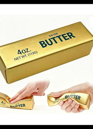 Антистресс сквиш масло butter золотое 14х4 см