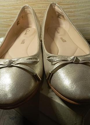 Золоті балетки clarks