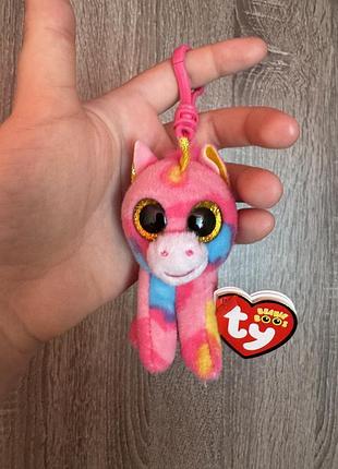 Це м'яка іграшка-брелок ty beanie boo's у формі єдинорога "фантазія" з фірмовими великими...