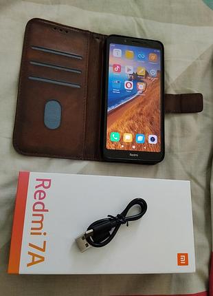 Телефон xiaomi redmi 7a 2/32gb черного цвета