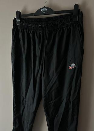 Спортивні штани nike sportswear windrunner men's woven trousers