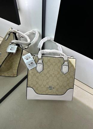 Стильна жіноча сумка coach