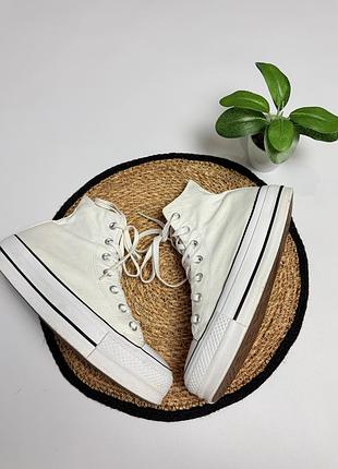 Білі високі кеди converse