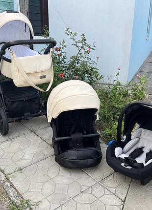 Стильна бежева коляска з екошкіри 3 в 1 riko montana
