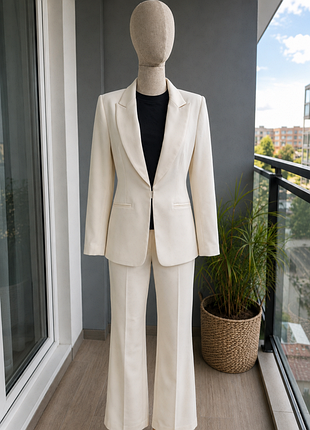Костюм жіночий діловий collection молочний піджак + брюки клеш s-m
