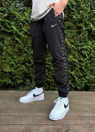 Нейлонові штани nike