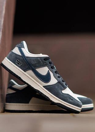 Nike sb dunk low x kaws white blue