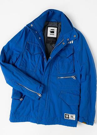 Чоловіча куртка g-star raw ewing trooper у яскравому, синьому кольорі, виконана у стилі military field jacket. модель має центральну застібку-блискав