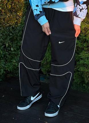 Нейлонові штани nike x corteiz