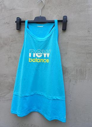 Женская футболка new balance wt11251 синего цвета