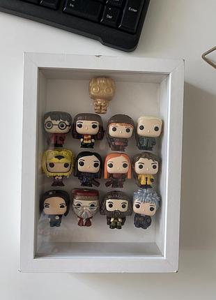 Колекція фігурок гаррі поттер в рамці kinder joy harry potter