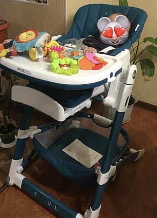 Стільчик для годування miobaby soul , бірюзового кольору .