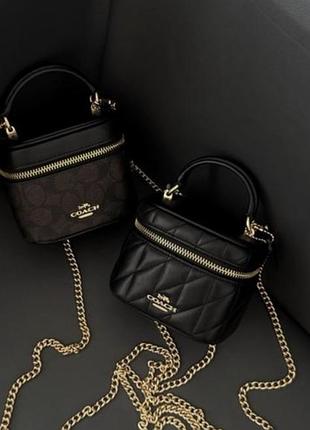 Сумочка бочонок coach коричнева на цепочці