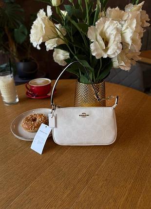Женская сумка coach nolita shoulder bag in signature canvas бежевая