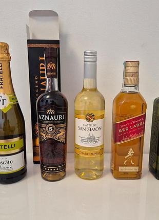 Алкогольные напитки, шампанское, виски, вино, коньяк