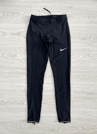 Nike оригінал новічоловічі тайтси з кишенею, з блискавками по низу штанини