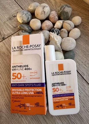 Солнцезащитный флюид с тонирующим и корректирующим эффектом la roche-posay anthelios uvmune 400 anti-dark spot fluid spf 50+ (50 мл)