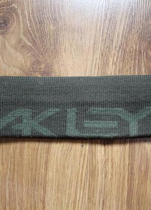 Зелена унісекс в'язана пов'язка на голову від oakley
