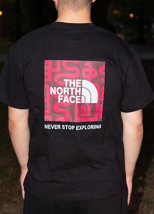 Футболка the north face чорного кольору