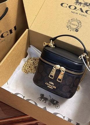 Сумочка бочонок coach коричнева на цепочці