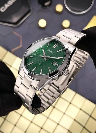 Чоловічий наручний годинник casio mtp-vd03d-3a1 сріблястий із зеленим циферблатом