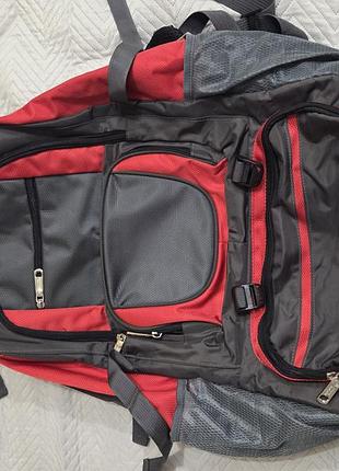 Рюкзак classic 60+10 l - красно-черный, туристический, с верхним клапаном и несколькими карманами.