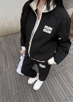 Чорно білий костюм miu miu штани та зіп кофта