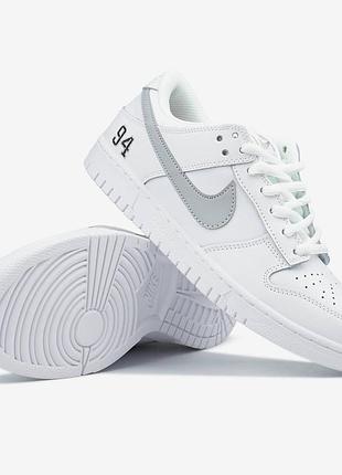 Nike sb dunk low x supreme white grey