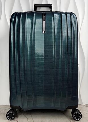 Надлегка валіза samsonite nexis 76 cm deep petrol roxkin з дорожнім органайзером для речей