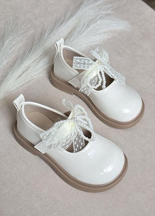 Туфлі на дівчинку